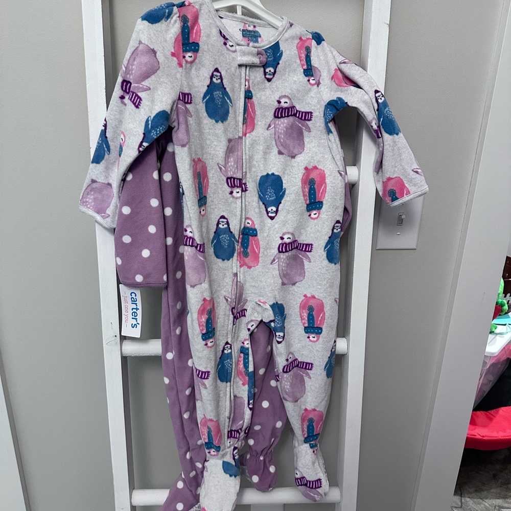 NWT 2-pack 2T Carter’s footie zip up pajamas